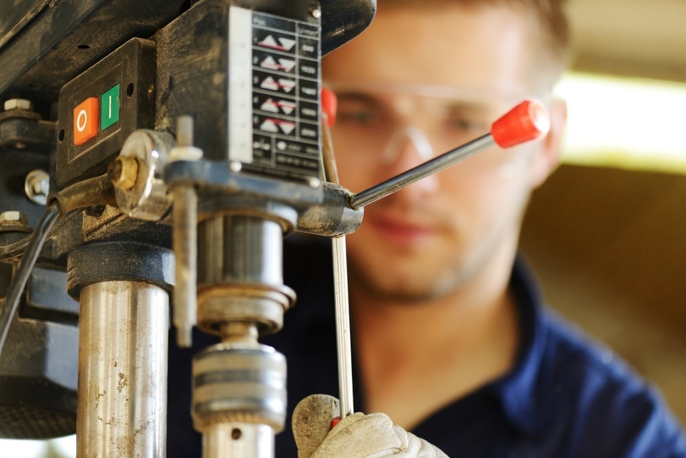 Young worker working in workshop